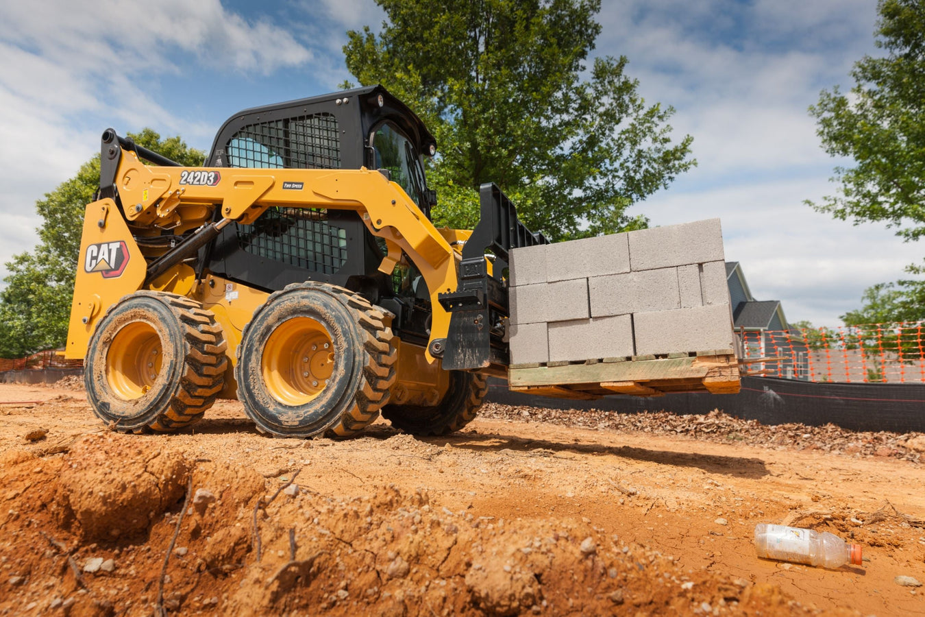 Cat 242D3 skid steer loader delivers 74 HP, 2,150 lb ROC, and vertical lift design for powerful lifting, loading, and material handling in demanding jobsites